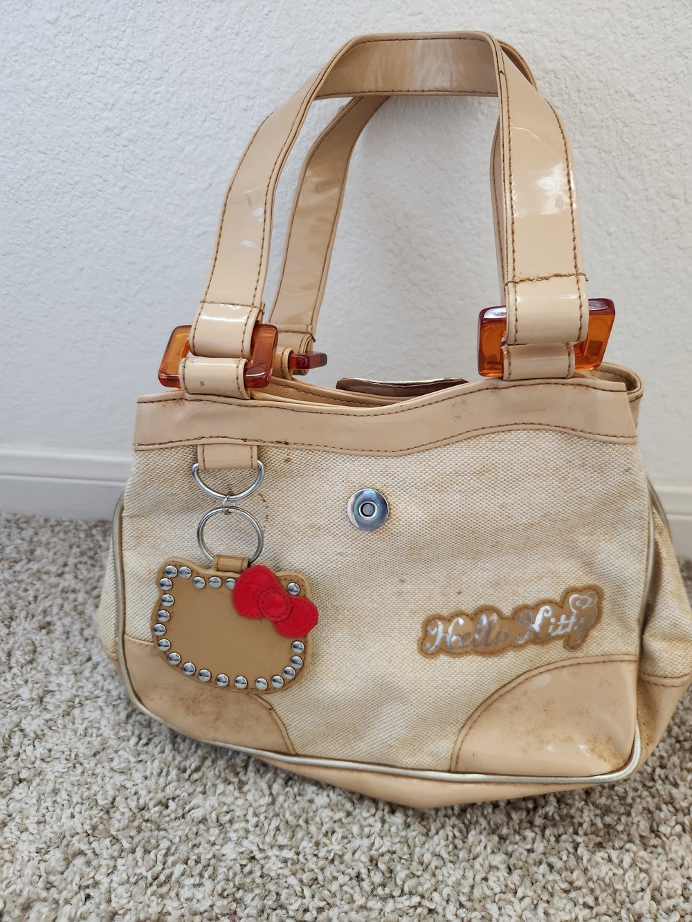 Hello Kitty Beige Canvas Shoulder Bag with Red Bow Charm
